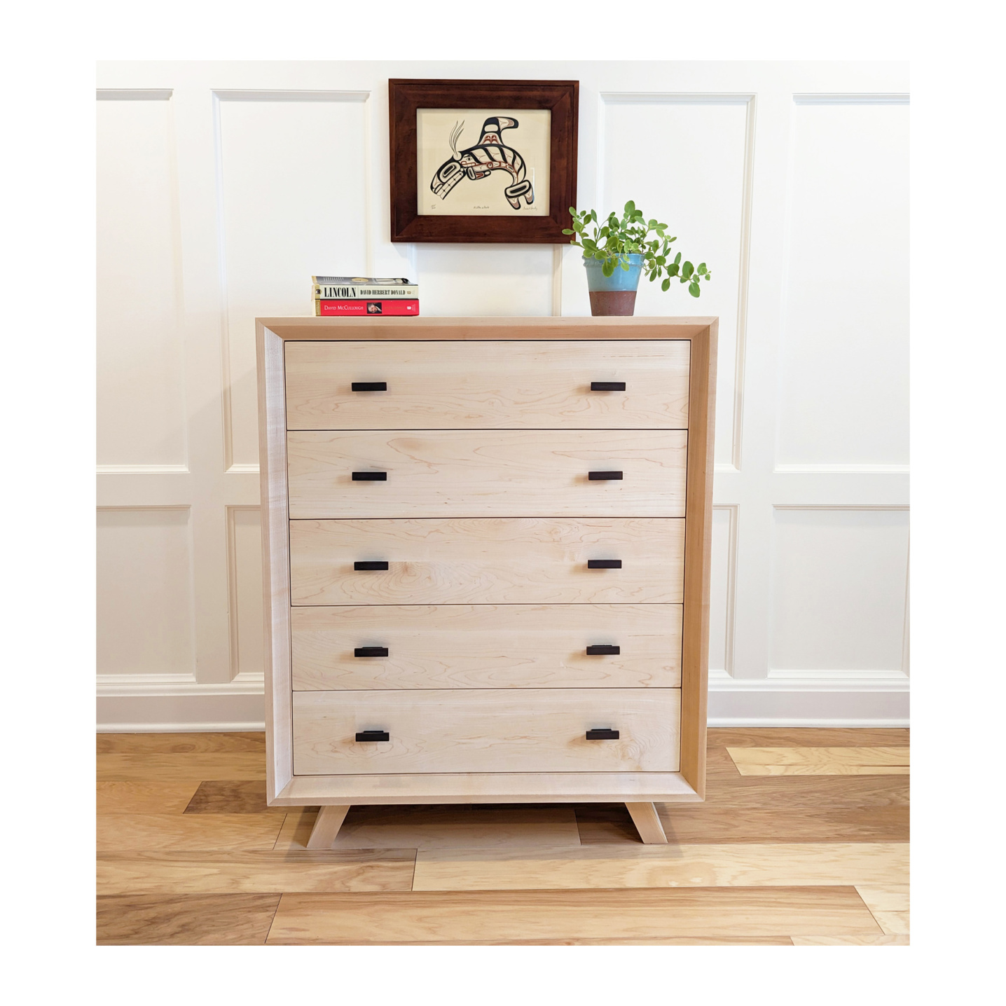 Tall dresser constructed of maple wood