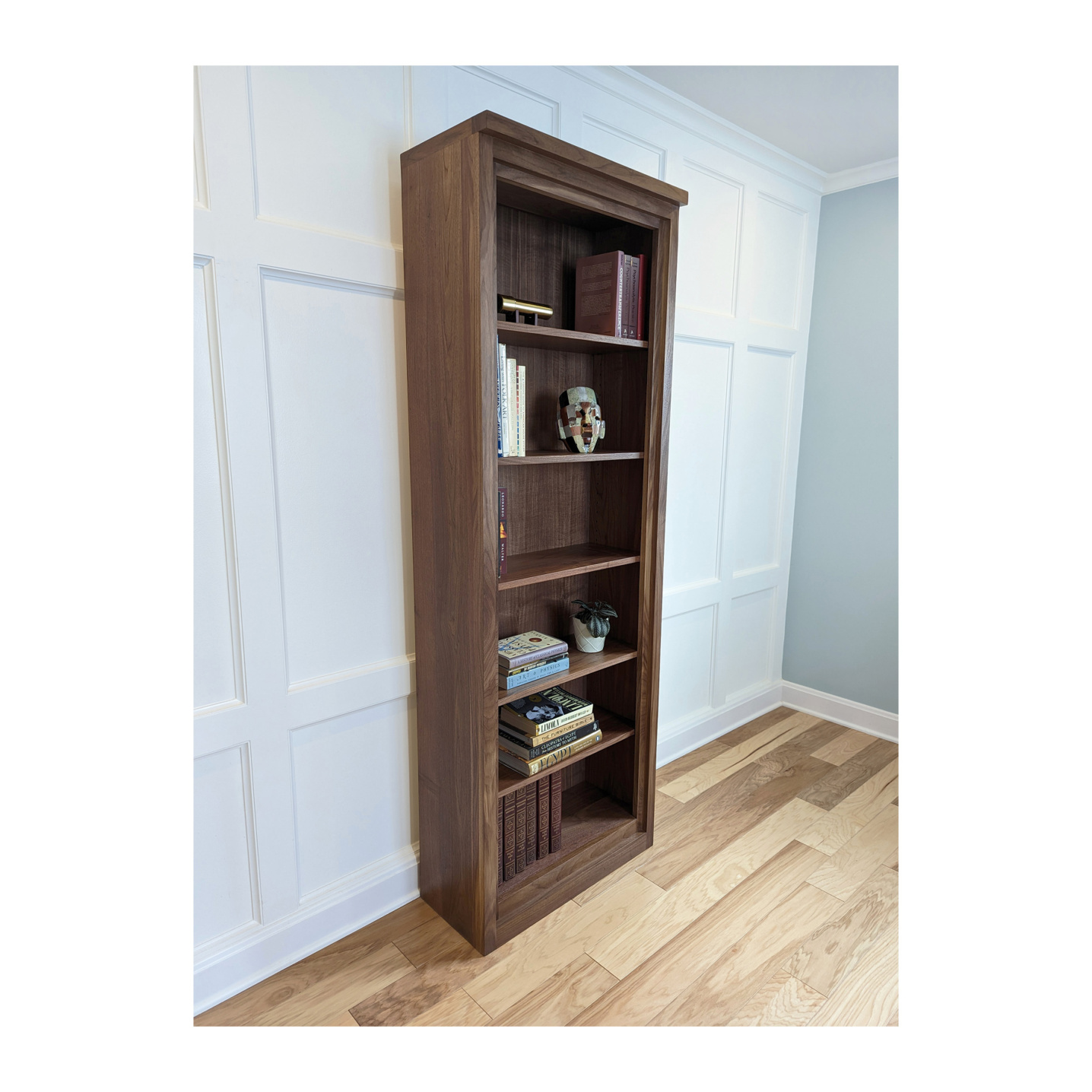 Walnut Bookcase--the bookcase has a modern design with adjustable shelves--Made by 57NorthPlank Tailored Fine Furniture